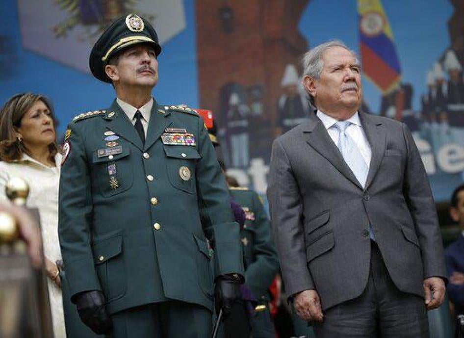 Colombia's army commander, General Nicacio Martínez Espinel, left, and Colombia's Defense Minister Guillermo Botero, attend a military ceremony where Martínez was promoted to 4 star General, in Bogotá, Colombia, Friday, June 7, 2019.