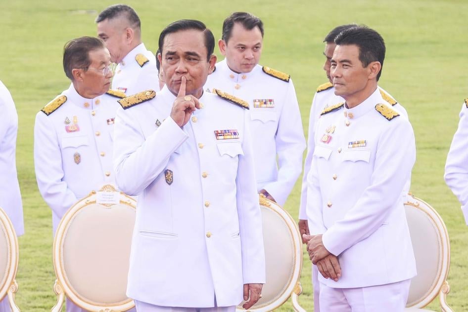 Thailand's Prime Minister Prayut Chan-o-cha arrives for a group photo with his cabinet members at the government house in Bangkok.  © 2019 Vichan Poti/Pacific Press/Sipa USA via AP Images