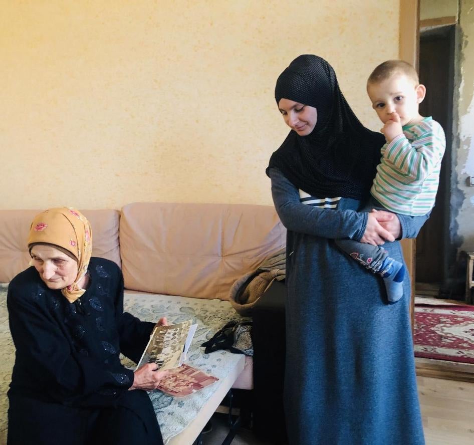 The mother, wife and son of Ruslan Suleimanov, one of the men arrested on politically motivated terrorism charges in Crimea on March 27, 2019. 