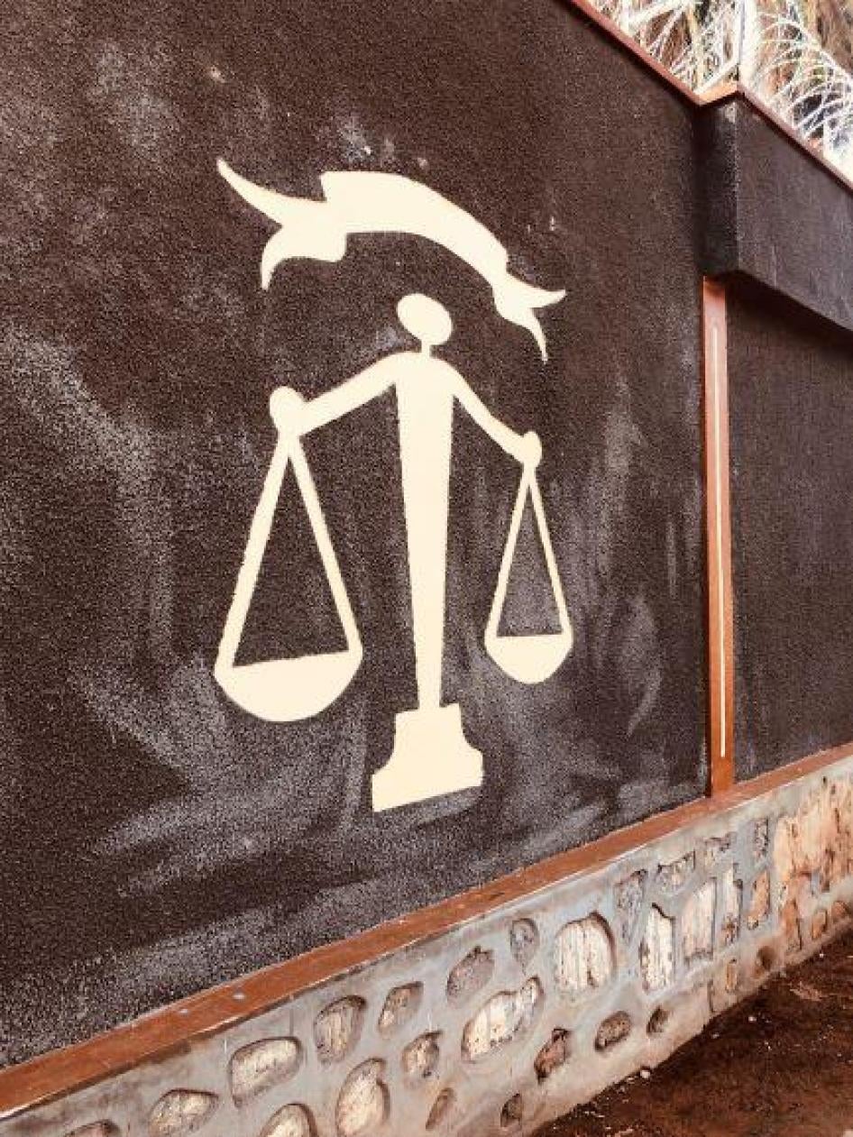 An image of the justice scales adorns the wall outside the Special Criminal Court premises in Bangui, Central African Republic. © 2019 Elise Keppler / Human Rights Watch