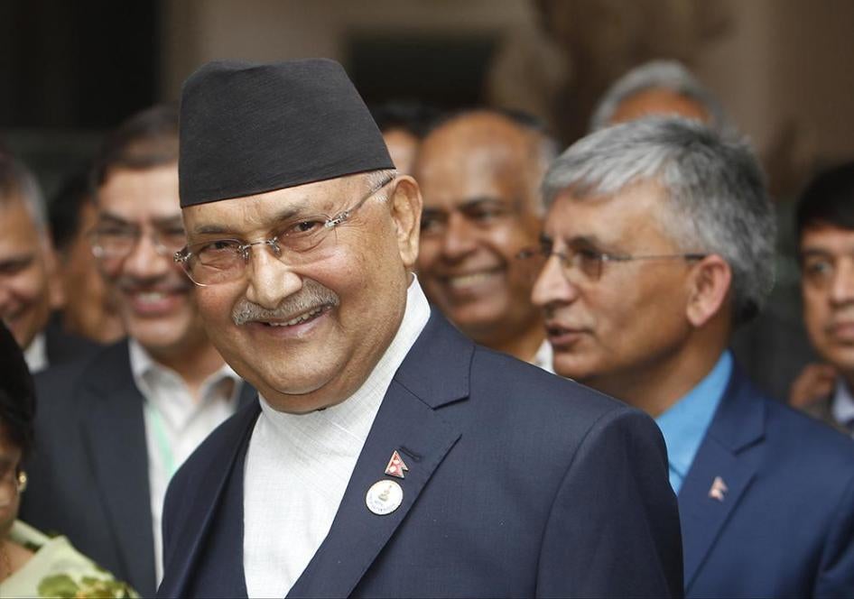 Nepal's Prime Minister K.P. Sharma Oli, foreground, tours Cambodian National Museum in Phnom Penh, Cambodia, Tuesday, May 14, 2019. 