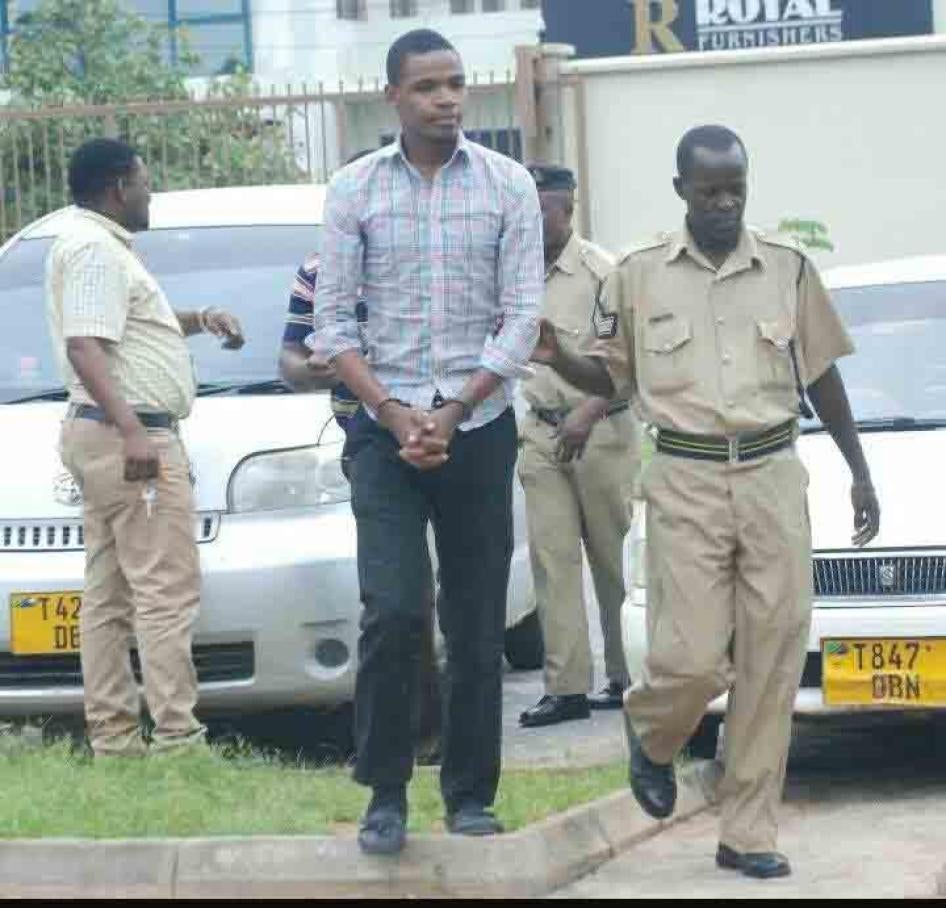 Prison guards escort Bob Chacha Wangwe to the Kisutu Magistrates Court in Dar es Salaam, May 11, 2016.