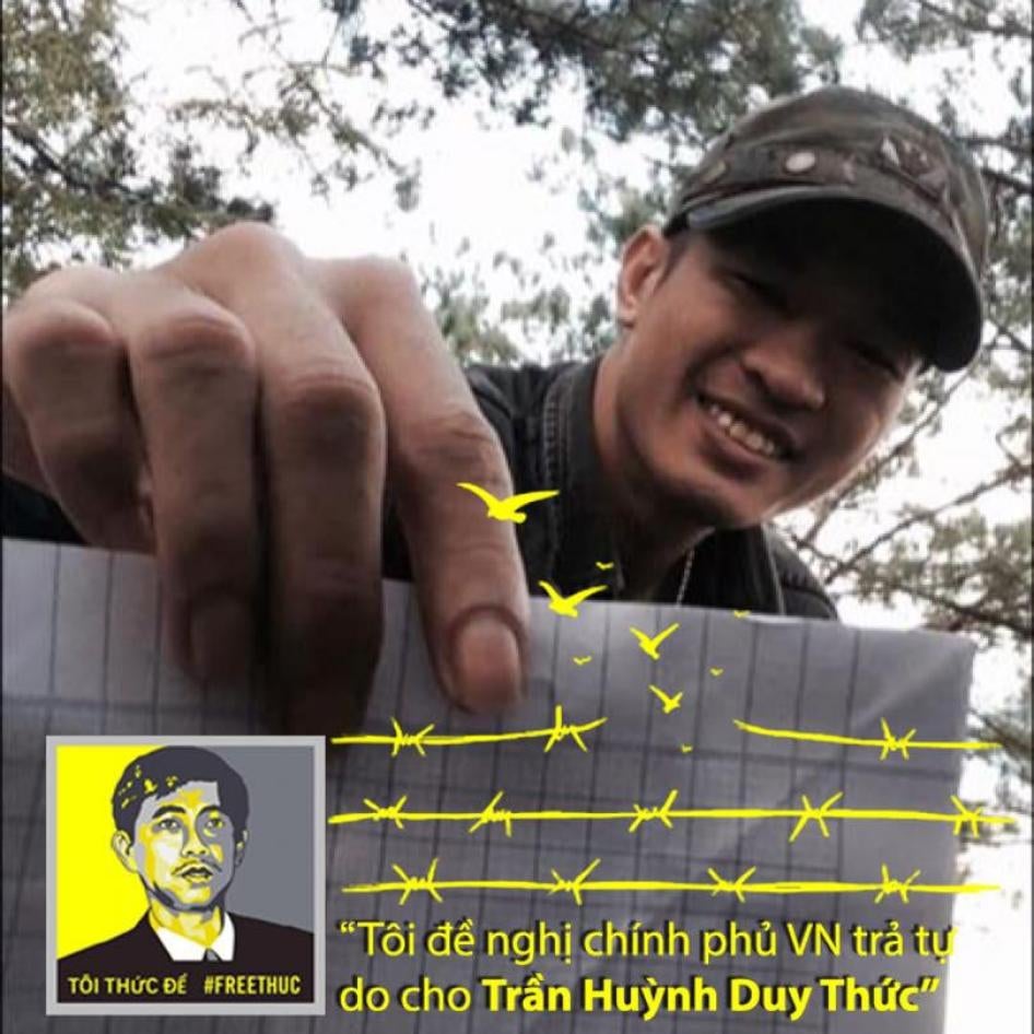 Nguyen Quoc Duc Vuong supports prominent blogger Tran Huynh Duy Thuc, who is serving a 16-year prison sentence. His sign reads, "I recommend the government of Vietnam to release Tran Huynh Duy Thuc."