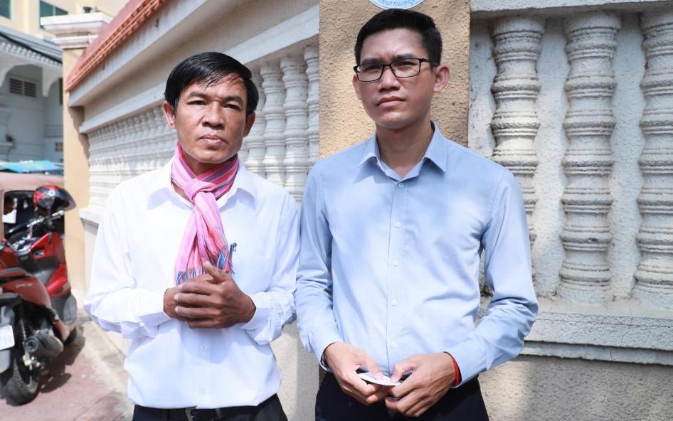 Uon Chhin and Yeang Sothearin outside the courthouse in Phnom Penh, October 3, 2019.