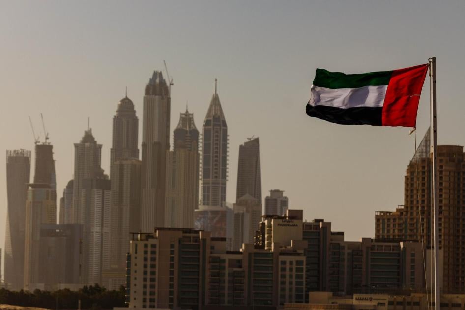 UAE flag with Dubai skyline