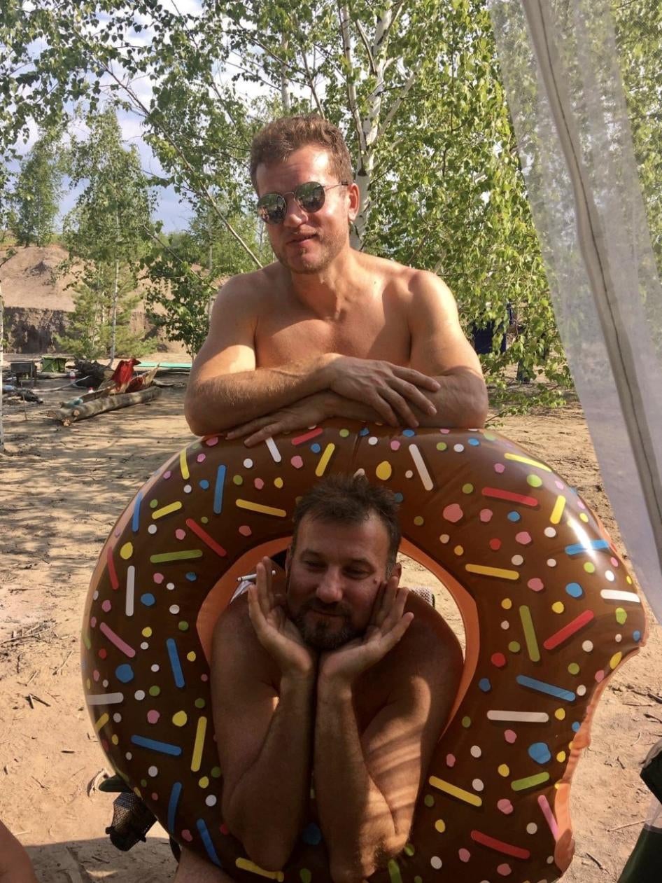  Edalov (lower) and his partner Evgeny Efimov at a picnic in June 2019, days before he was killed.