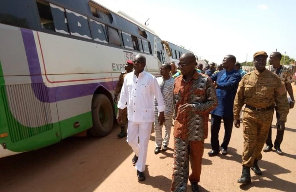 On November 7, 2019, Defense Minister Cherif Sy and his delegation examine a few of the buses ambushed by armed Islamists the day before.