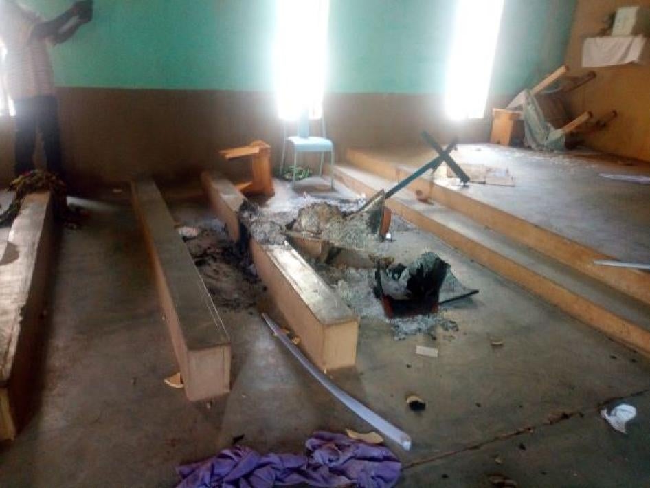 Charred church robes, documents, and other materials burned by armed Islamists during the May 12, 2019 attack on the Dablo Catholic Church.