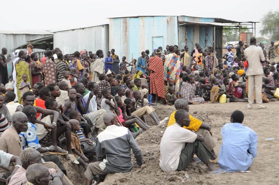 Victims of ethnic violence in Jonglei, state, South Sudan, wait in line at the World Food Program distribution center in Pibor to receive emergency food rations, January 12, 2012.