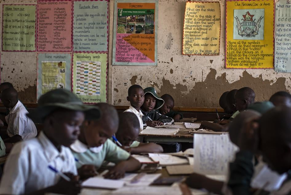Schoolchildren attend class at a school in Norton, west of the capital Harare, Zimbabwe, September 10, 2019.