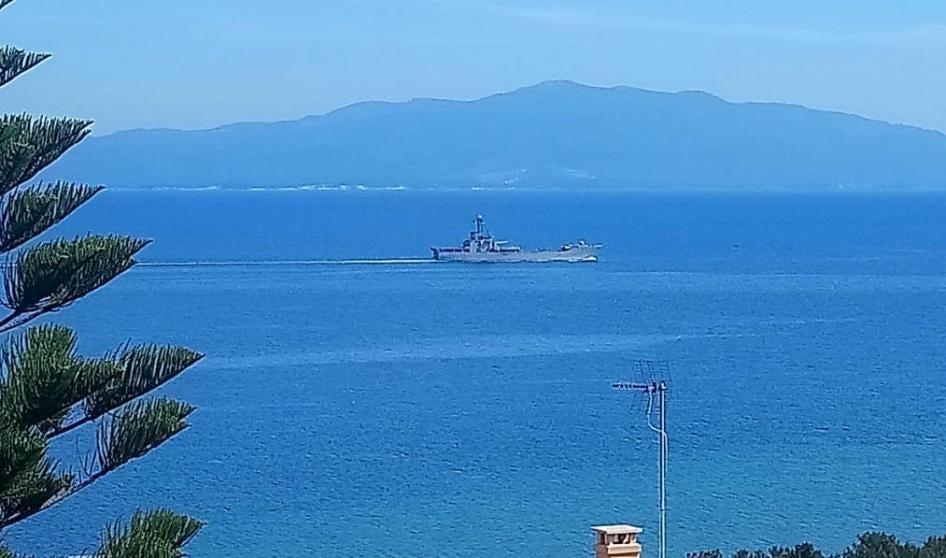Greek naval vessel holding newly arrived asylum seekers and migrants, shortly after departing Mytilene harbor, March 14, 2020.