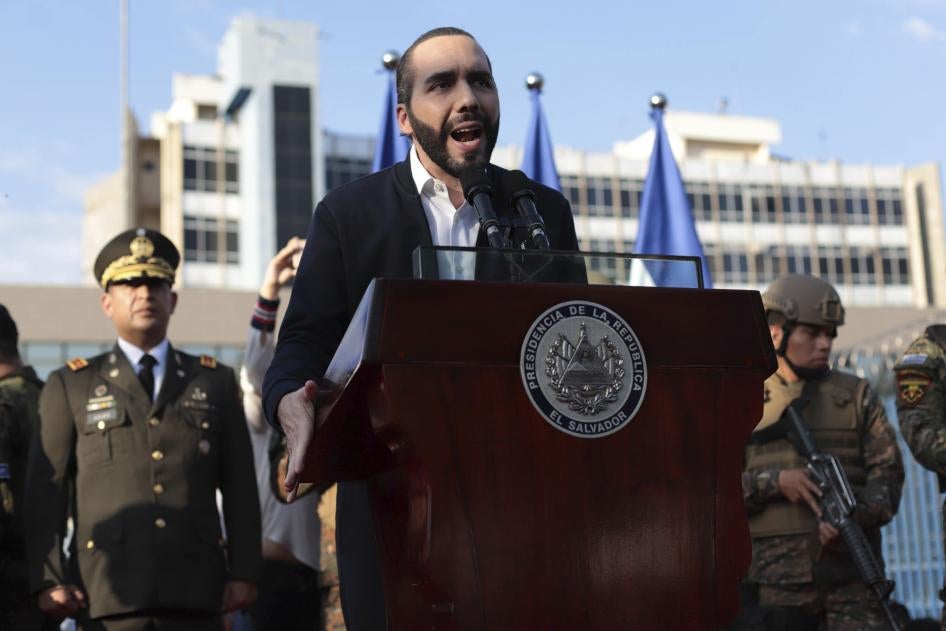 El Salvador's President Nayib Bukele, accompanied by members of the armed forces, speaks to his supporters outside Congress in San Salvador, El Salvador.