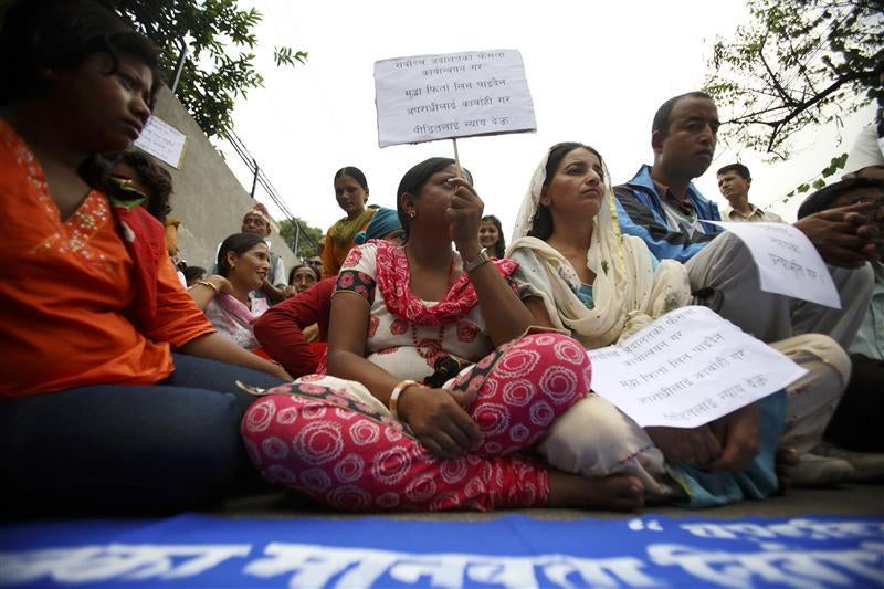Protesters call for justice for atrocities committed during Nepal's civil war at a sit-in in Kathmandu on June 6, 2011.