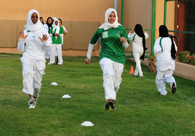 Members of the Jeddah Kings United all-female team attend football exercise in Jeddah, Saudi Arabia.