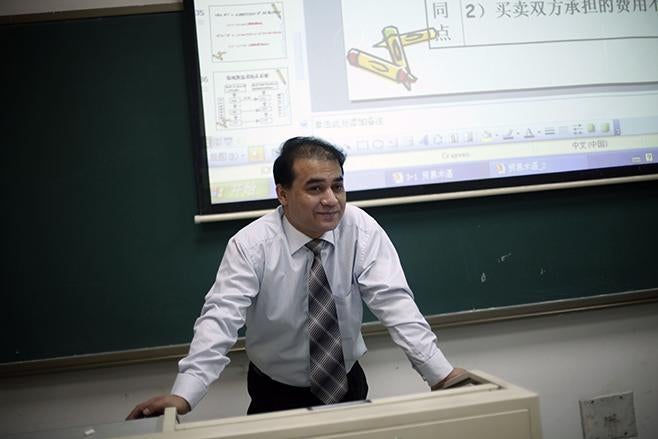 Ilham Tohti speaks to students at Beijing’s Minzu University of China in 2009.