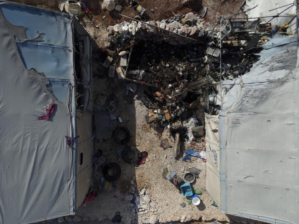 An aerial shot showing the destruction caused by cluster munitions attack of the Maram camp.