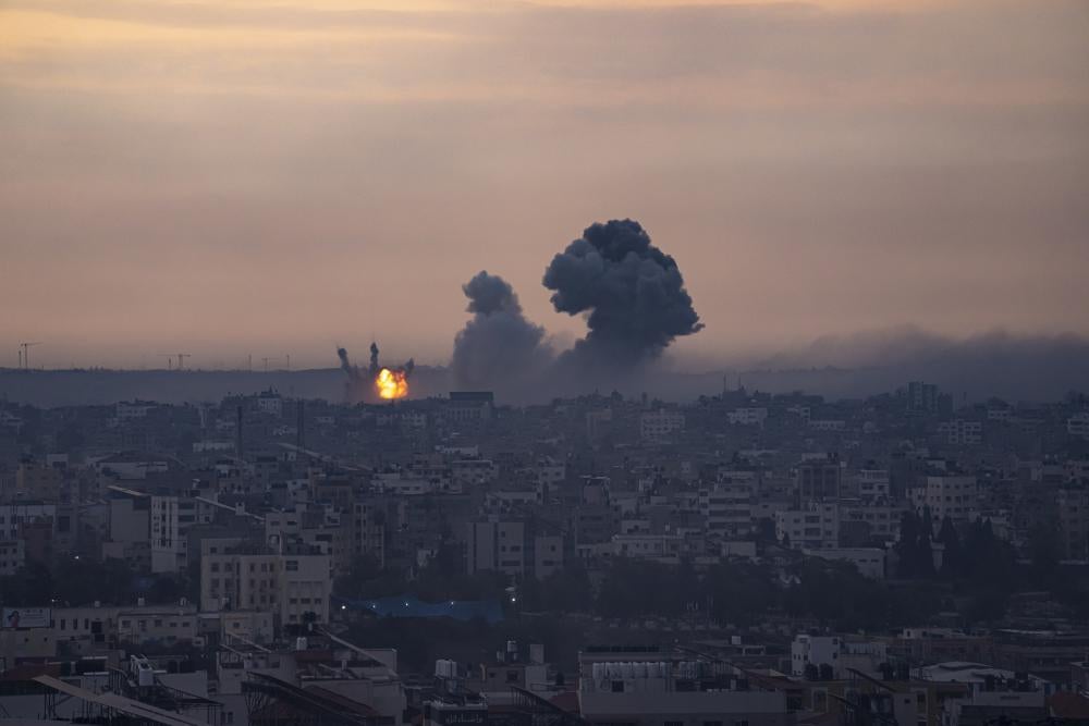 Smoke rises after air strike in the Gaza Strip on Monday, Oct. 9, 2023.