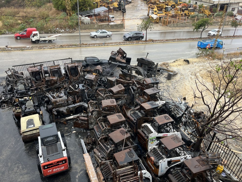 Damaged “Bobcat” Bulldozers from Israeli airstrikes on October 11, 2025 on heavy machinery showrooms in Msayleh, southern Lebanon.
