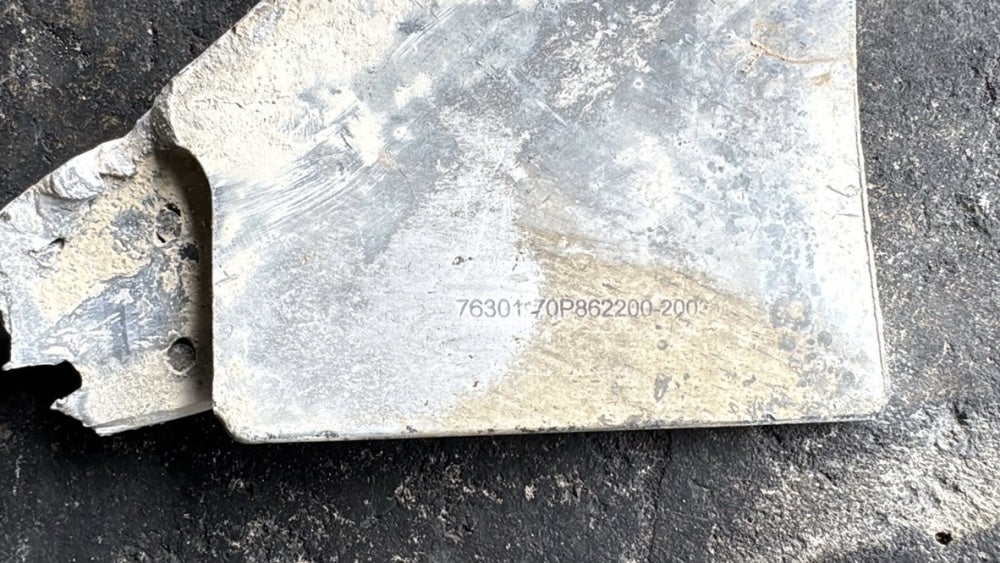 A remnant of a tail fin, found in Msayleh, of a US-produced Joint Direct Attack Munition (JDAM) guidance kit.