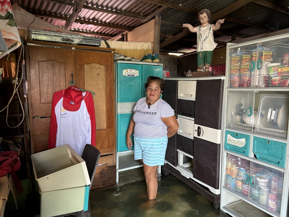 Maria Mallari's home at the Pulo relocation site was built without elevation, allowing flood waters to enter her home every day, July 14, 2026.