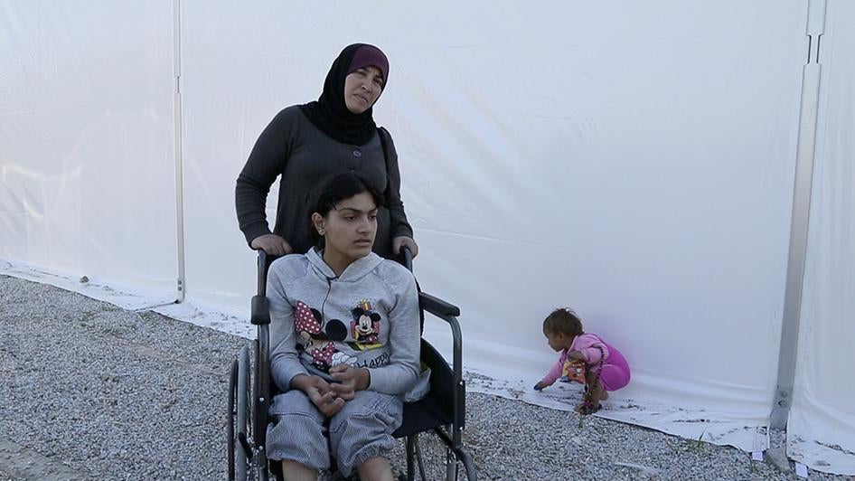 Sara, a 13-year-old Syrian girl traveling with her older sister and mother, has a physical disability and diabetes. Separated from her family on the rubber boat from Turkey, she slumped into the water at the bottom of the dinghy and fell unconscious. 