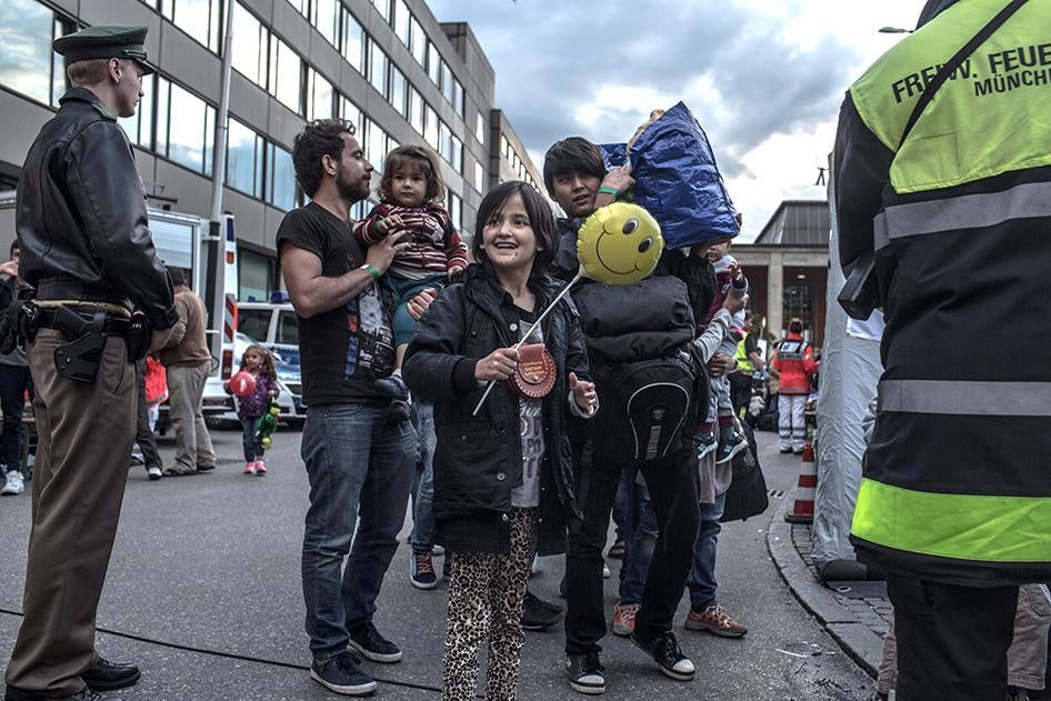 Refugees arrive at the main train station in Munich, Germany, on September 5, 2015. 