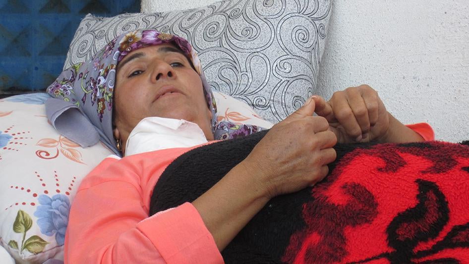 Zarga, 41, who was wounded in the attack on June 25, 2015 in Kobani, Syria, counts the 23 neighbors who were killed that day. 