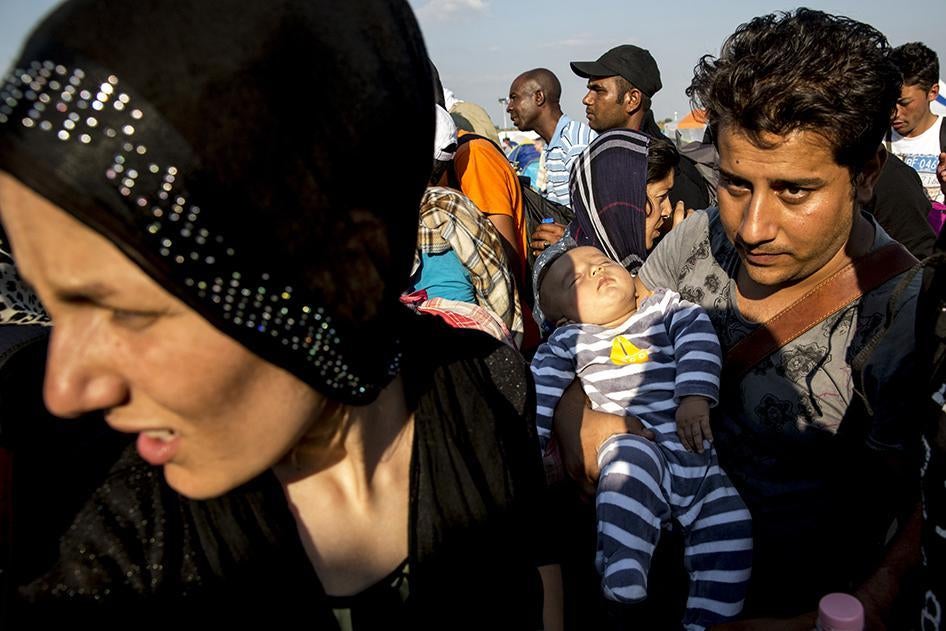 Amier (right) and his wife Navida, Afghan asylum seekers, said they were separated from their baby for three hours when they were fired upon by Iranian border guards while crossing the border from Iran to Turkey. September 13, 2015.