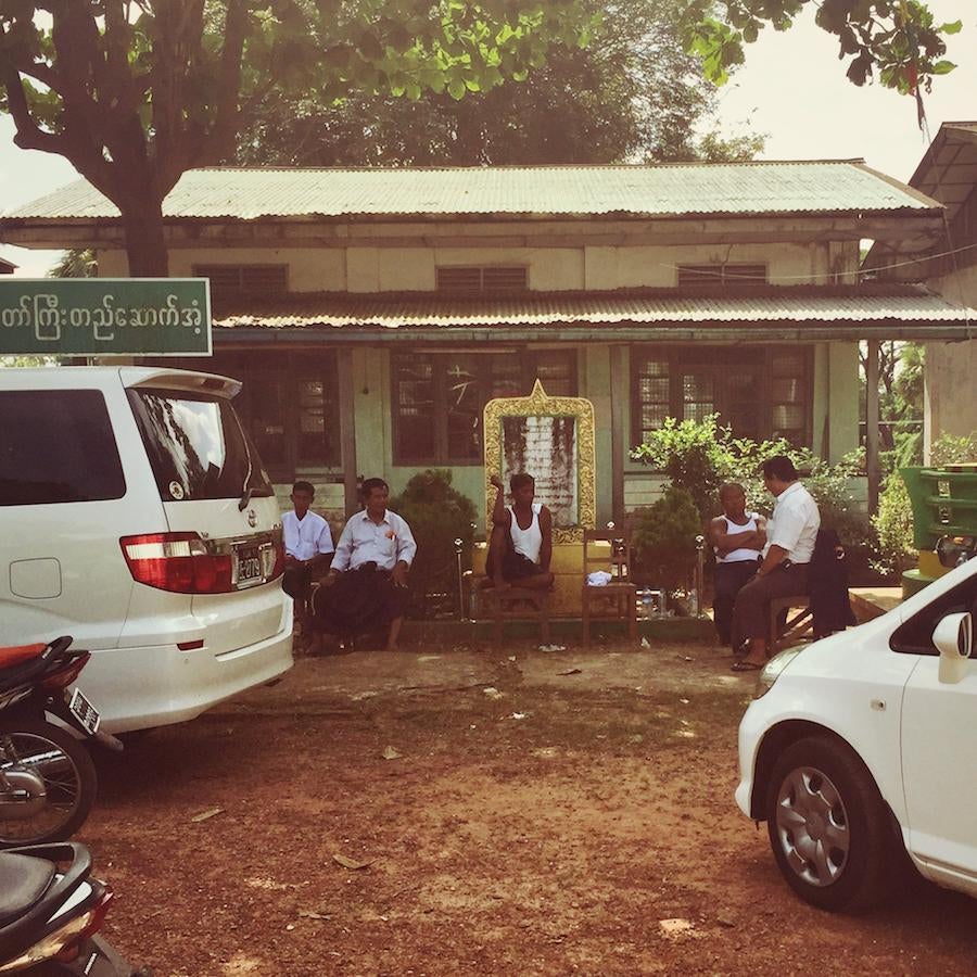 In Moulmein, voting has slowed to a trickle in the agressive midday heat. Security guards remove their uniforms and polling station officers take lunch in shifts. 