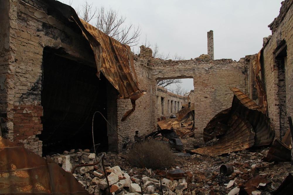 A fire, apparently started by an airstrike, completely destroyed School Number 2 in Stanytsia Luhanska in August 2014. © 2015 Yulia Gorbunova/Human Rights Watch