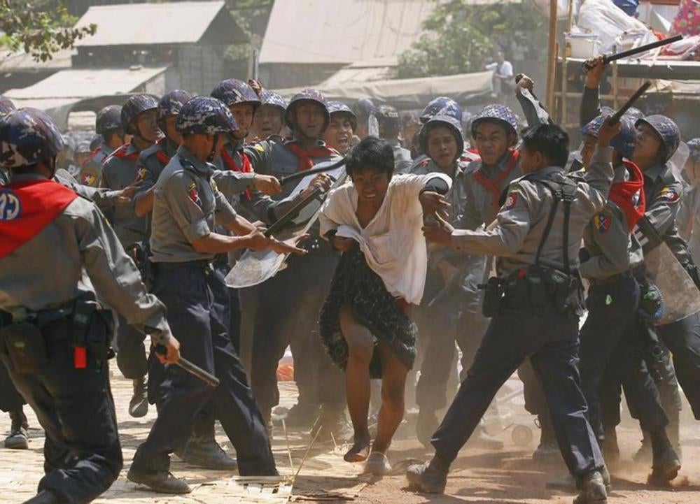 Police clash with students protesting the national education bill in Letpadan on March 10, 2015. 