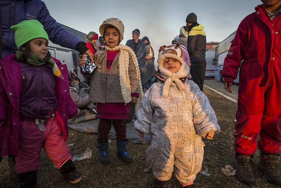 A group of children among hundreds of asylum seekers and migrants staying in freezing conditions at a gas station near the Greek border with Macedonia. January 29, 2016.