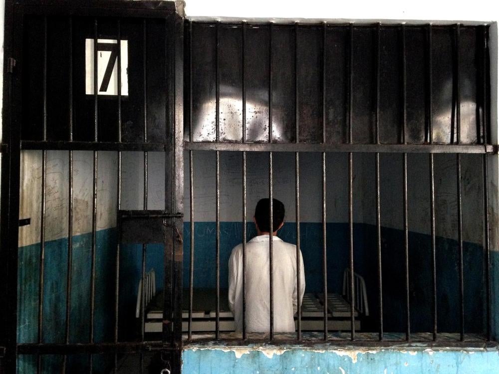 A man held in the isolation cell in Bengkulu mental hospital in Sumatra.