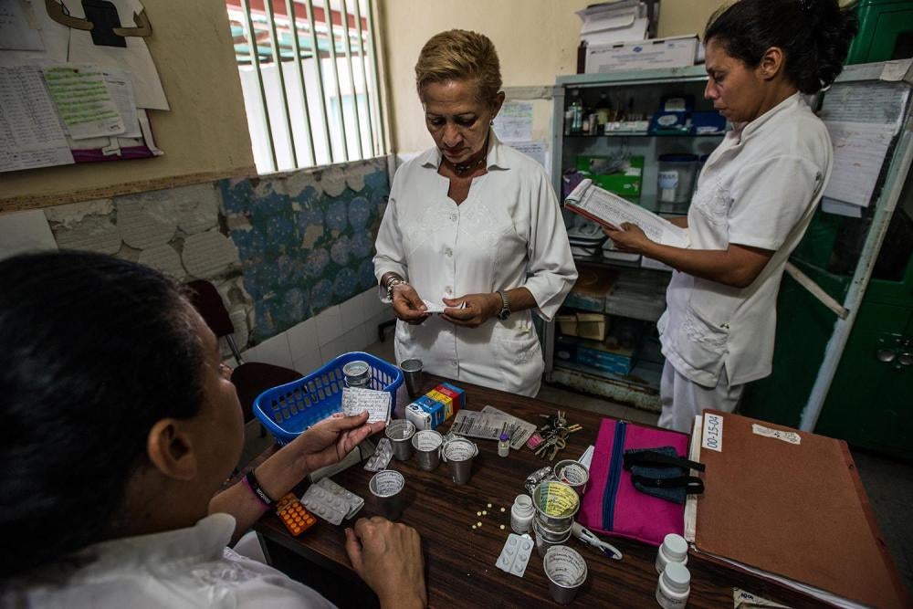Nurses at a hospital in Barquisimeto discuss which patients will receive medicines and which will have to wait due to severe shortages of medicines at the hospital, August 24, 2016. 