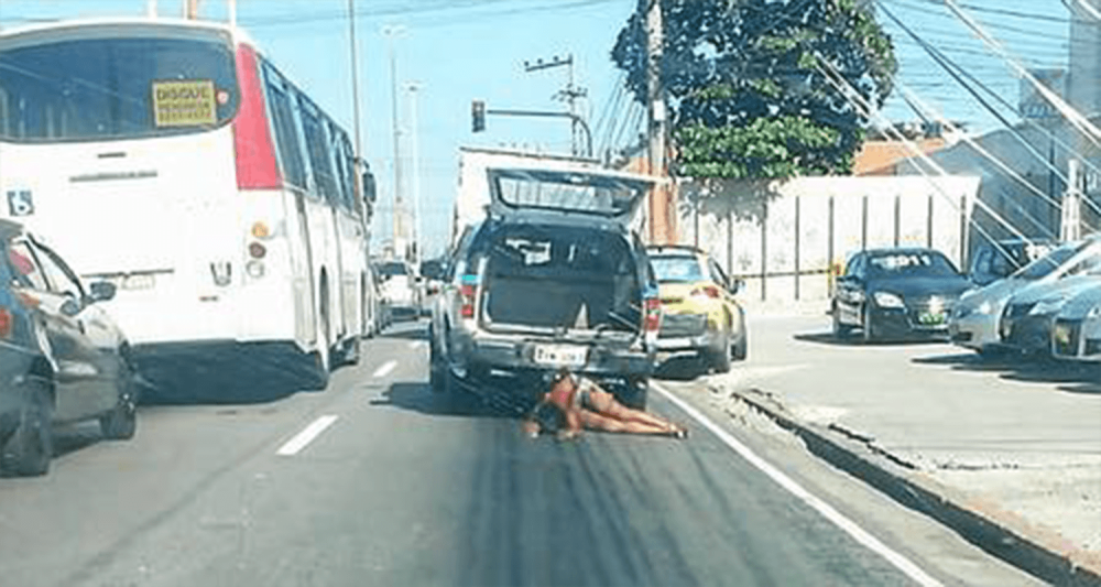 Still from an amateur video showing Claudia Silva Ferreira being dragged by a police patrol car on March 16, 2014.
