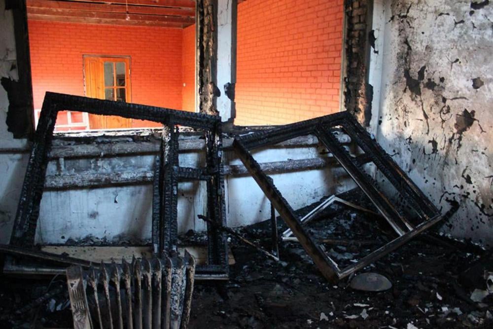 Décombres d’une maison incendiée dans le village de Yandi, en Tchétchénie, en décembre 2014. L’un des membres de la famille habitant dans cette maison était soupçonné d’être un rebelle.