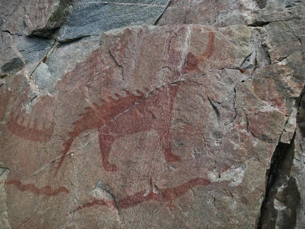 Pictograph of Mishibijiw on the shores of Lake Superior. Mishibijiw is an Ojibwe water spirit and this site is considered sacred to Batchewana First Nation.
