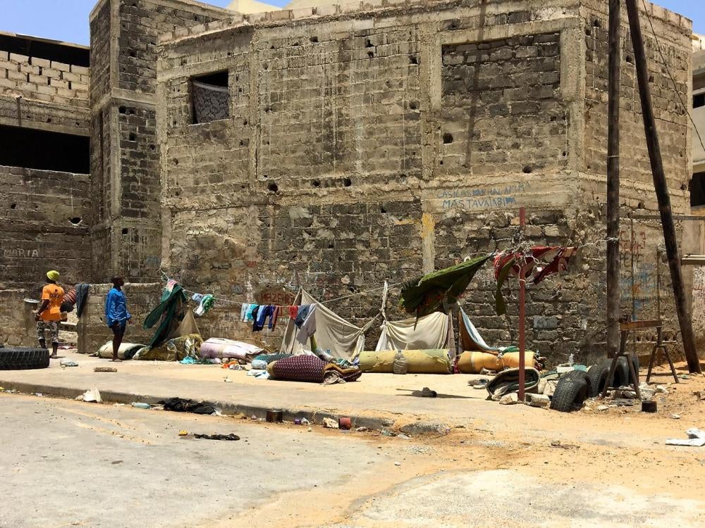 This daara (Quranic school) in Guédiawaye, Dakar, which houses from 70-100 talibés is notorious among child protection workers for its horrific conditions. Sleeping mats and blankets are seen stacked against the exterior walls of the daara.