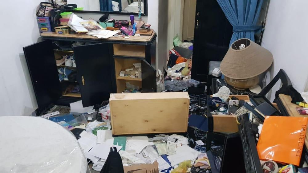 Photos of what the family alleged was the aftermath of the police raid to arrest lawyer, Hoda Abdel Moneim, from her home. 