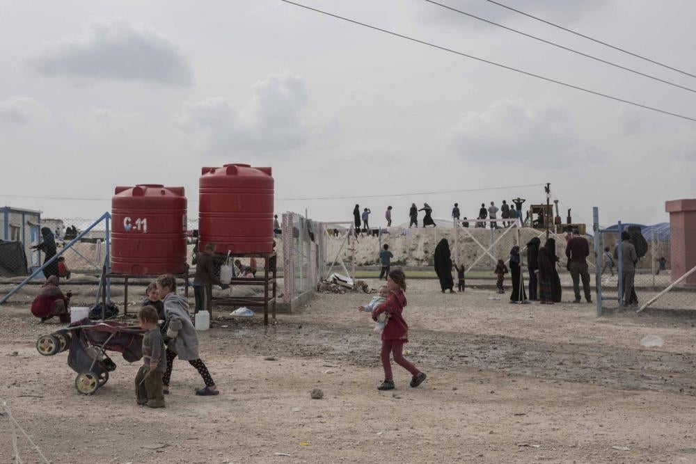 Children can be seen throughout al-Hol annex caring for other children. More than two-thirds of the foreigners in the annex are younger than 12, and most children are younger than 5. Children often lug jugs of water to their tents from large tanks. Camp i