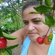Person faces fruit tree.