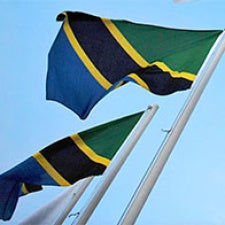 Two Tanzanian flags fly. 