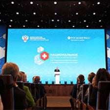 Panelists address crowd. 