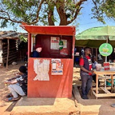 People stand on the roadside in Malawi