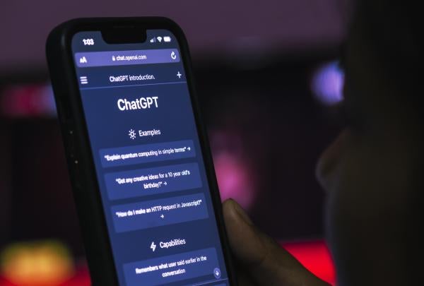 A person uses ChatGPT on their mobile phone
