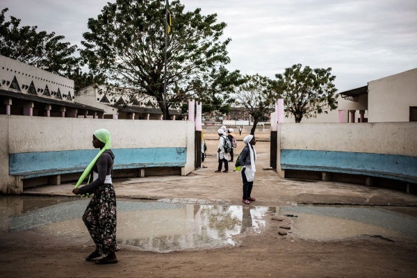 Girls in front of a school building