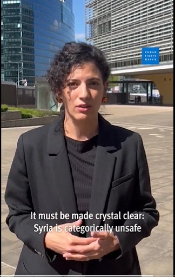HRW Senior Researcher Hiba Zayadin speaking in front of the European Commission Headquarters in Brussels, Belgium, during the 2024 Syria Conference