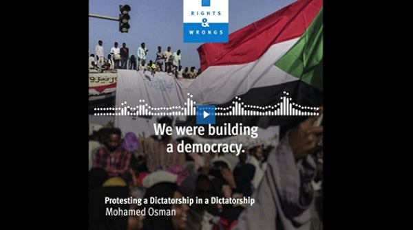 People protesting and the Sudanese flag 