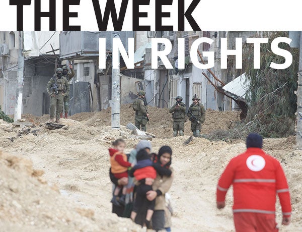 Aid workers walk through the West Bank. 