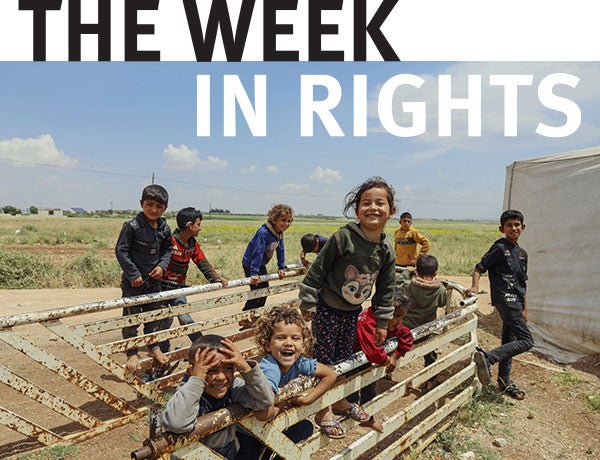 Children face camera.